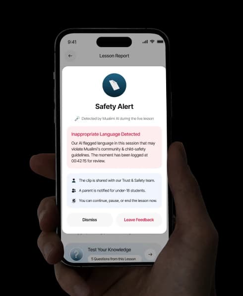 A Mualimi safety alert during a live lesson, on a phone